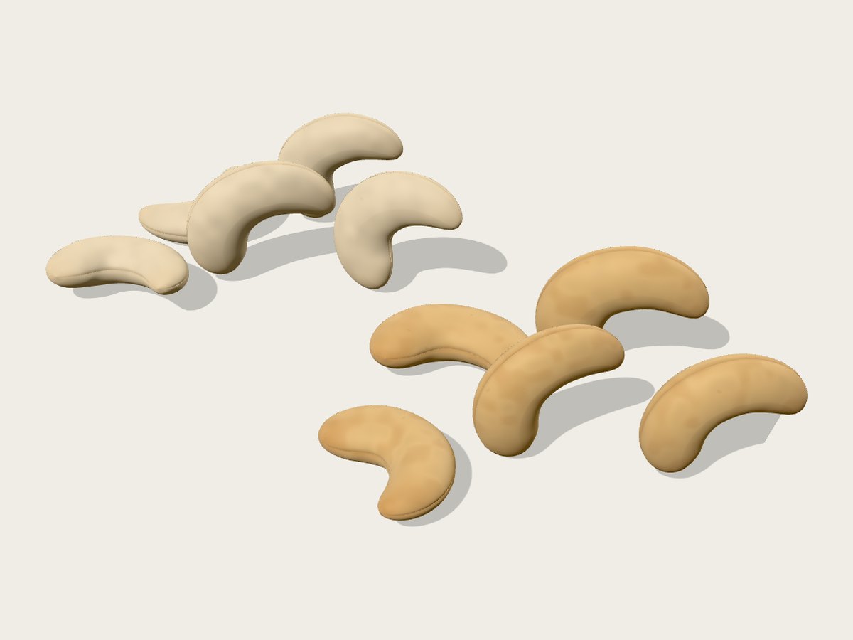 Whole white and scorched cashew kernels